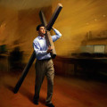 man holding cross